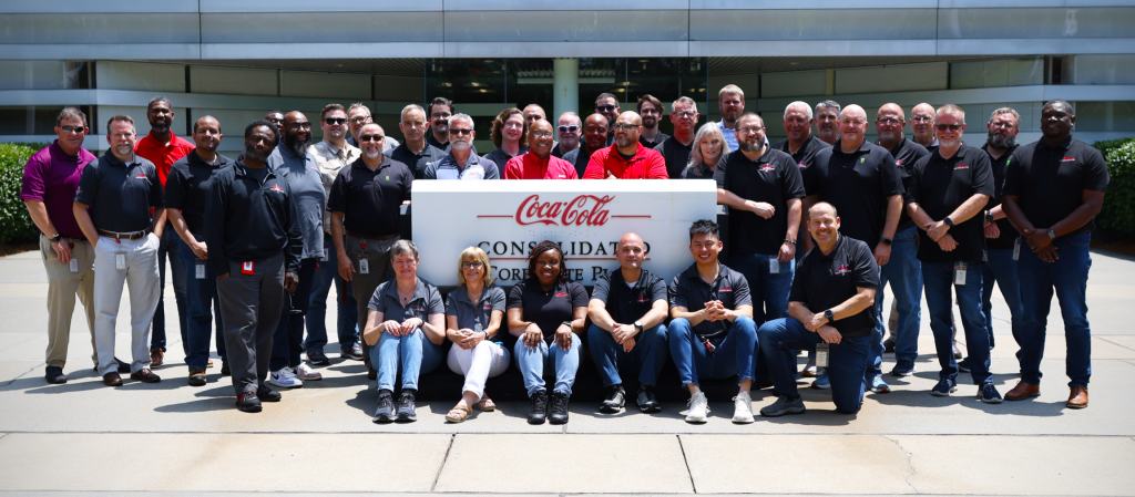 Rory Regan with his team at Coca-Cola Consolidated (pictured front row, furthest right).